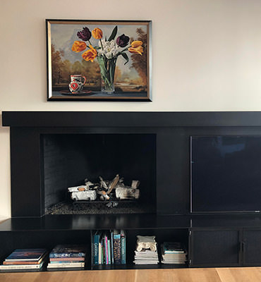 Metal fireplace with black patina finish