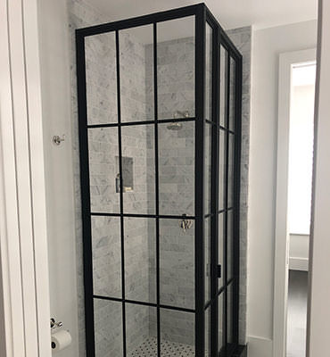 Steel and glass shower enclosure
